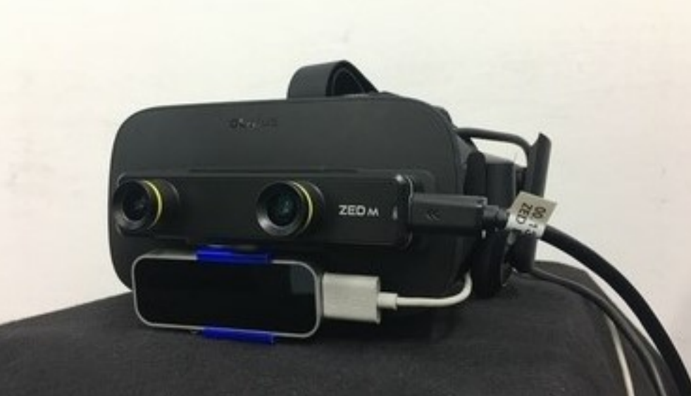 ZED Mini and LEAP Motion mounted on a Oculus Rift 